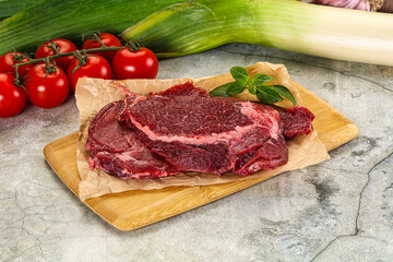 Raw beef cheeks cut for cooking