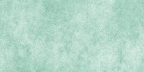 Abstract Elegant dark green background with mottled vintage texture in old fancy background design, texture of colored parchment paper.	