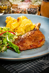 Roasted duck leg.
