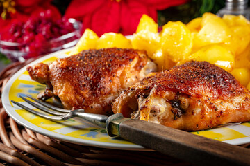 Two baked pieces of chicken.