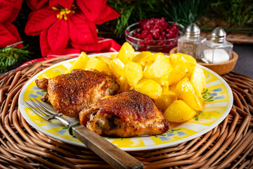 Two baked pieces of chicken.