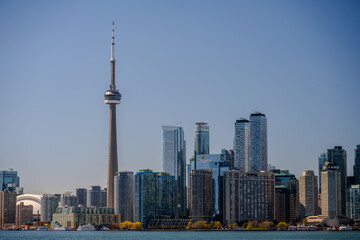 Fototapeta premium Modern skyline with CN Tower above the waterfront in Toronto