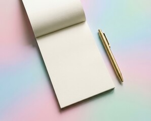 Notepad and pen on pastel background for writing ideas and notes during creative work or study sessions in a quiet environment