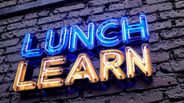 Bright neon lunch learn sign glowing on textured brick wall, educational event and corporate training concept