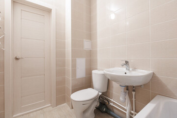 modern bathroom room with toilet and washing machine
