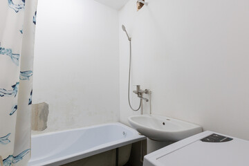 modern bathroom room with toilet and washing machine