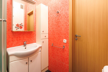 modern bathroom room with toilet and washing machine