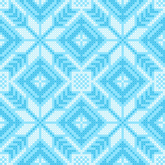 Christmas cross-stitch blue seamless pattern