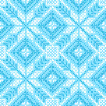 Christmas cross-stitch blue seamless pattern