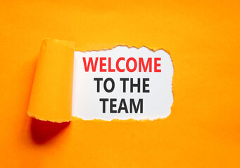 Support, help welcome to the team symbol. Concept words Welcome to the team on beautiful white paper. Beautiful orange paper background. Business welcome to the team concept. Copy space.