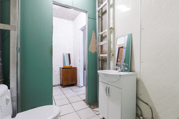 modern bathroom room with toilet and washing machine
