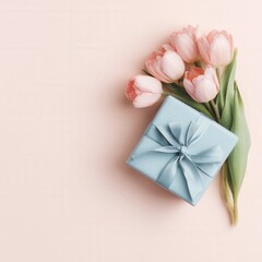 Pastel gift box with pink tulips on soft background
