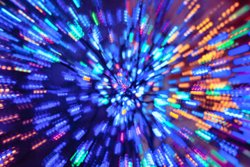 Christmas lights zooming in effect, splash of colour and motion blur.
