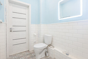 modern bathroom room with toilet and washing machine