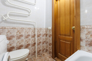modern bathroom room with toilet and washing machine