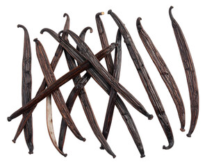 Dry, dark brown, aromatic pods scattered on black