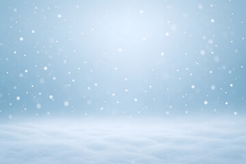 Gently falling snowflakes over a light blue snowy ground, creating a peaceful and wintry seasonal backdrop..