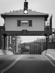 The Mill River Swing Bridge Control Booth in New Haven, a historic movable bridge connecting to the Fair Haven neighborhood in Connecticut, United States, captured in retro-style monochrome.