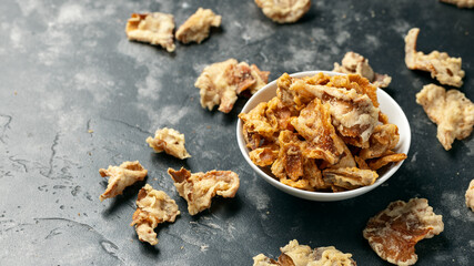 Crispy Fried Mushroom chips, snack in a white bowl