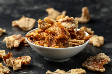 Crispy Fried Mushroom chips, snack in a white bowl