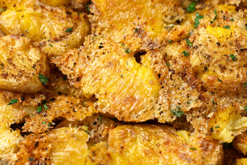 Crispy Parmesan smashed potato, background, texture