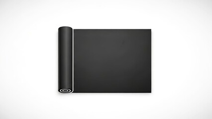 Black yoga mat rolled out on white background  