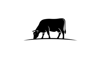Black Silhouette of a Grazing Cow.