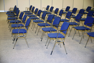 A large empty boardroom with empty chairs
