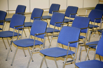 A large empty boardroom with empty chairs