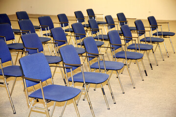 A large empty boardroom with empty chairs