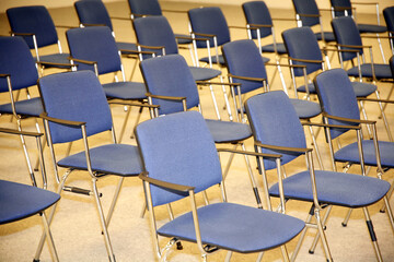A large empty boardroom with empty chairs