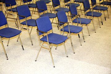 A large empty boardroom with empty chairs
