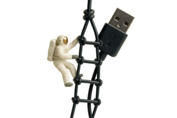 Astronaut Climbing a USB Cable: An astronaut figurine diligently scales a knotted USB cable, symbolizing technological exploration and digital connectivity.