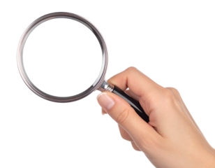 Hand holding a magnifying glass, examining something unseen