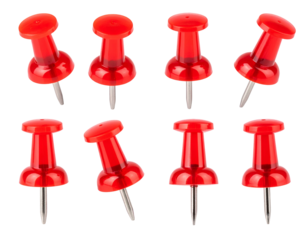 Set of eight red push pins on black