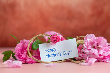 Beautiful bouquet of roses and a thank you note for a gift