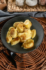 Homemade lazy noodles with cheese, crumbs and melted butter.