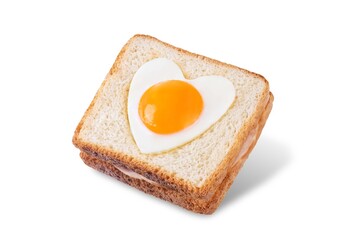 Heart shaped fried egg sandwich with ham and heart for Valentine's Day on a white isolated background