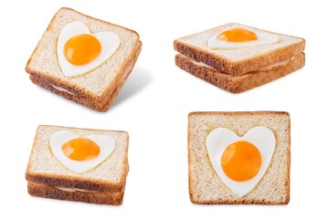 Heart shaped fried egg sandwich with ham and heart for Valentine's Day on a white isolated background