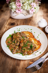 Crispy potato pancakes with mushroom sauce
