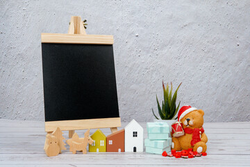 Holiday planning and inspirational message concept showing chalkboard, festive decorations, cozy...