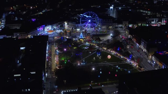 Night Drone Flight Over Christmas Market and Ferris Weel
