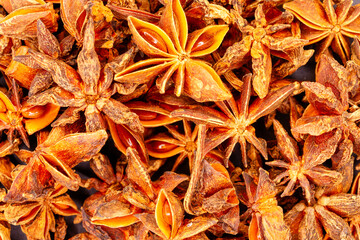 Dried star anise spice background texture