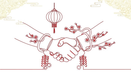 Celebrating Chinese New Year with a Traditional Handshake and Festive Decorations