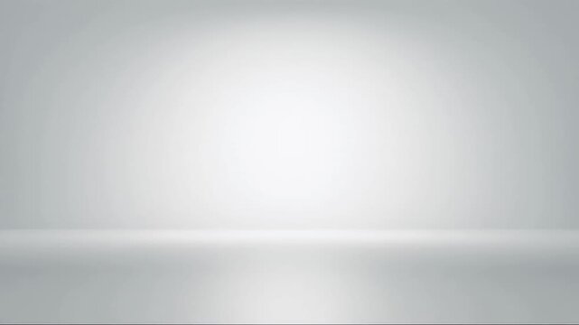 A clean, minimalist studio background features a soft gradient transitioning from light grey to white, with a radiant central light source that subtly dims. The polished, reflective floor enhances the