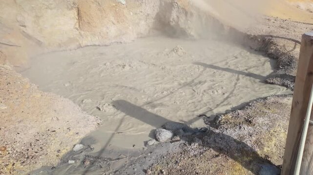 This scenic view captures the steam vents and boiling mud pots of the Sulphur Works hydrothermal area at Lassen Volcanic National Park
