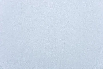 A plain, light gray background with a smooth texture. The surface appears soft and uniform, suitable for various design applications.