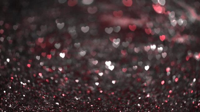 Abstract heart bokeh background with soft red and white glowing lights. Romantic love concept, Valentine&rsquo;s Day, wedding, celebration and dreamy atmosphere.