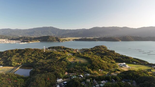 Shimakishi, Itoshima, Fukuoka, Japan Coastline in Autumn: 4K Aerial Drone Footage of Hikizu Bay, Rural Beach, Islands, Mountain Forests, Fish Cage, Houses, Estates near Genkai Quasi-National Park