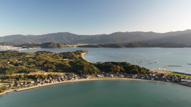 Shimakishi, Itoshima, Fukuoka, Japan Coastline in Autumn: 4K Aerial Drone Footage of Hikizu Bay, Rural Beach, Islands, Mountain Forests, Fish Cage, Houses, Estates near Genkai Quasi-National Park